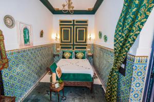 Postel nebo postele na pokoji v ubytování Riad Nouceiba Marrakech