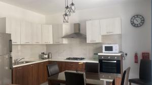 Kuchyň nebo kuchyňský kout v ubytování Apartment Triq is-Silla