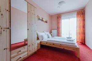 Posteľ alebo postele v izbe v ubytovaní Villa Corvina + 37 fotografií