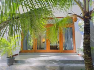 Κήπος έξω από το New Ocean Breeze Madiha