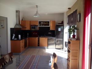 Küche/Küchenzeile in der Unterkunft Vent d'Ouest