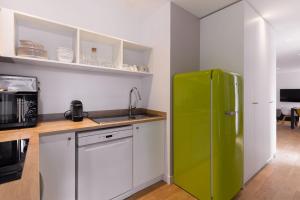 A cozinha ou cozinha compacta de Le Cornouaille Hotel & Spa