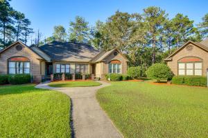 a house with a pathway in front of a yard at Modern McCormick Townhome on Lake Thurmond! in McCormick