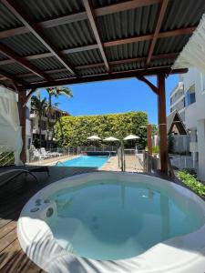 Swimmingpoolen hos eller tæt på Cobertura com vista mar