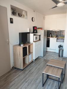 Kuchyňa alebo kuchynka v ubytovaní Appartement vue mer Le Barcarès