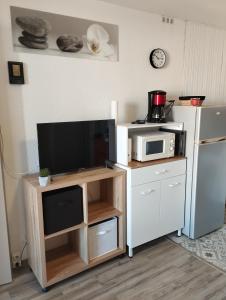 Kuchyňa alebo kuchynka v ubytovaní Appartement vue mer Le Barcarès