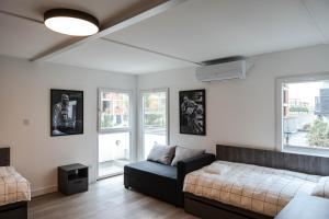 Postelja oz. postelje v sobi nastanitve REAL Suites
