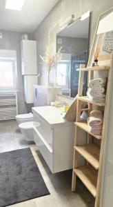 Kúpeľňa v ubytovaní Eximius Apartment + 37 fotografií