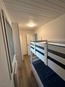 Postel nebo postele na pokoji v ubytování Strandperle