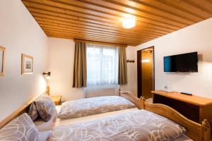 Katil atau katil-katil dalam bilik di Hotel Brienzerburli