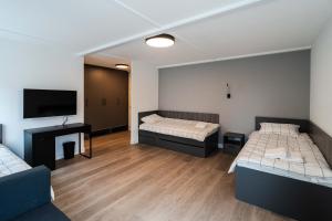 Postelja oz. postelje v sobi nastanitve REAL Suites