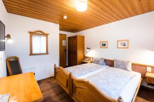 Katil atau katil-katil dalam bilik di Hotel Brienzerburli