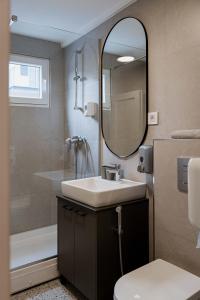 Kopalnica v nastanitvi REAL Suites