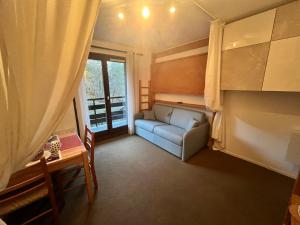 Postel nebo postele na pokoji v ubytování Emeraude, petit cocon proche des pistes