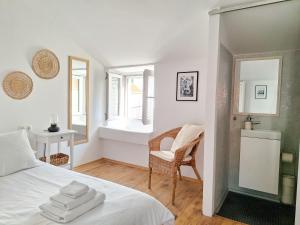 En eller flere senge i et værelse på St Peter's Heritage House