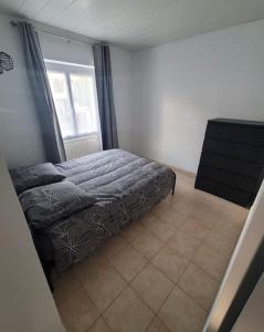 Postel nebo postele na pokoji v ubytování Appartement calme