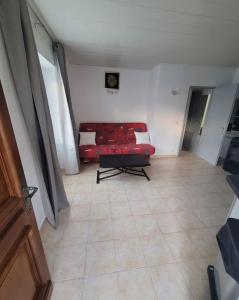 Posezení v ubytování Appartement calme