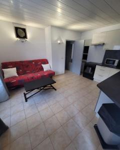 Kuchyň nebo kuchyňský kout v ubytování Appartement calme