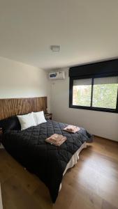 Ένα ή περισσότερα κρεβάτια σε δωμάτιο στο Departamento en Condominio Los Pasos - Fisherton