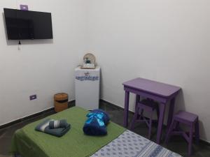 Televizors / izklaižu centrs naktsmītnē Aconchego Sol e Lua
