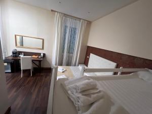 Antico Hotel Moderno客房内的一张或多张床位