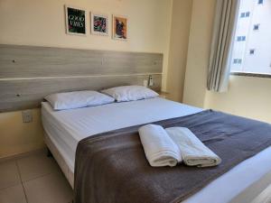 Postel nebo postele na pokoji v ubytování 202-Apartamento em Bombas 180mtrs do mar