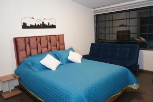 Katil atau katil-katil dalam bilik di Apartamento Azucena - Casa Tartaruga Bogotá