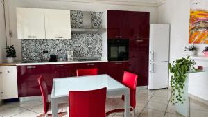 Kuchyňa alebo kuchynka v ubytovaní Amarin Pisa Apartment
