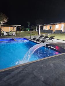 Bazén v ubytování Fazenda Nossa Senhora Aparecida nebo v jeho okolí