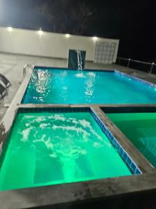 Bazén v ubytování Fazenda Nossa Senhora Aparecida nebo v jeho okolí