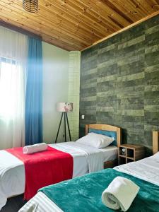 Postel nebo postele na pokoji v ubytování WoodStar