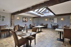 Posezení v ubytování Hotel-Restaurant La Crémaillère
