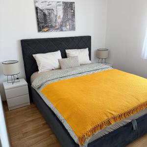 Postel nebo postele na pokoji v ubytování JR Lux apartman