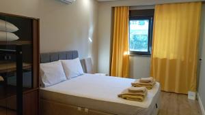 Postel nebo postele na pokoji v ubytování Mali Garden Residence + 37 fotografií