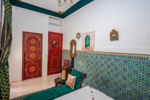 Postel nebo postele na pokoji v ubytování Riad Nouceiba Marrakech