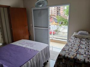 Letto o letti in una camera di sobrado 08 com duas suítes, conf