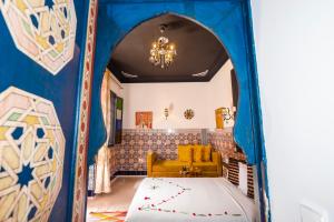 Postel nebo postele na pokoji v ubytování Riad Nouceiba Marrakech