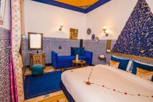 Postel nebo postele na pokoji v ubytování Riad Nouceiba Marrakech