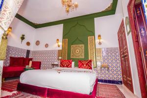 Postel nebo postele na pokoji v ubytování Riad Nouceiba Marrakech