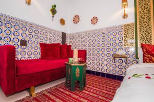 Postel nebo postele na pokoji v ubytování Riad Nouceiba Marrakech