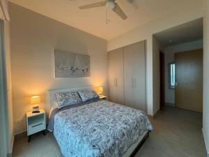 Rúm í herbergi á Apartamento en Playa Escondida - Vista al Mar