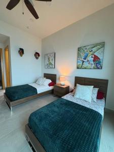 Rúm í herbergi á Apartamento en Playa Escondida - Vista al Mar