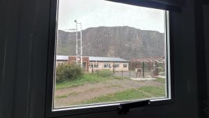 Nespecifikovaný výhled na hory nebo výhled na hory při pohledu z penzionu