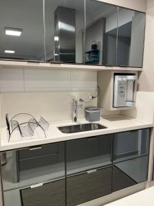 Mynd úr myndasafni af Quarto com Vista Mar í Florianópolis
