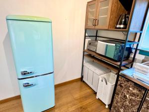 Kuchyň nebo kuchyňský kout v ubytování Grand Open!! Guest House 圭堂-Seidou- Free for rental bicycle and the washing machine and dry machine!!自転車レンタル無料!!無料ランドリー有!! + 23 fotografií