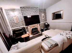 Et tv og/eller underholdning på Luxury King-size Rm