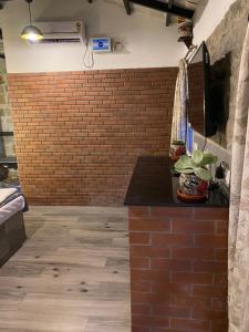Gambar di galeri bagi English Rustic Stone Cottage di Yelagiri