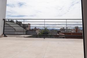 a view of a city from a balcony at Descubre Salta desde este Duplex acogedor in Salta