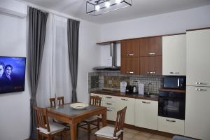 Η κουζίνα ή μικρή κουζίνα στο Roma Chic Cattolica Gemelli