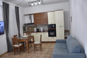 Η κουζίνα ή μικρή κουζίνα στο Roma Chic Cattolica Gemelli +113 φωτογραφίες